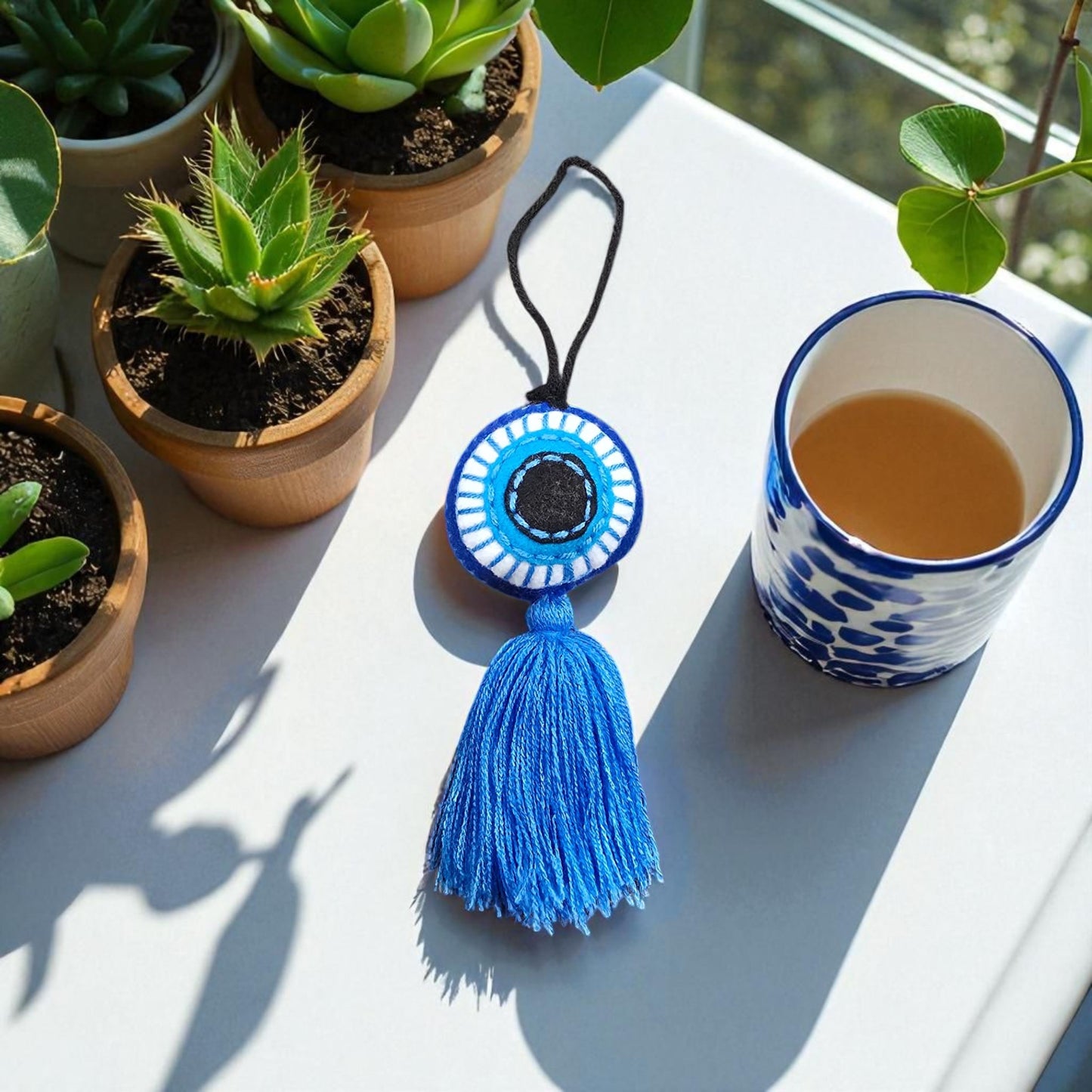 Evil Eye Embroidered Pompom With Tassel